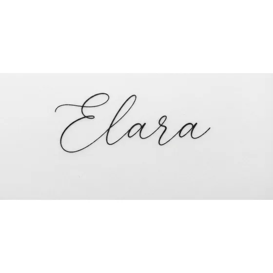 Memorial Tattoos example — Handwriting-style script of a short name, large letters, nothing else